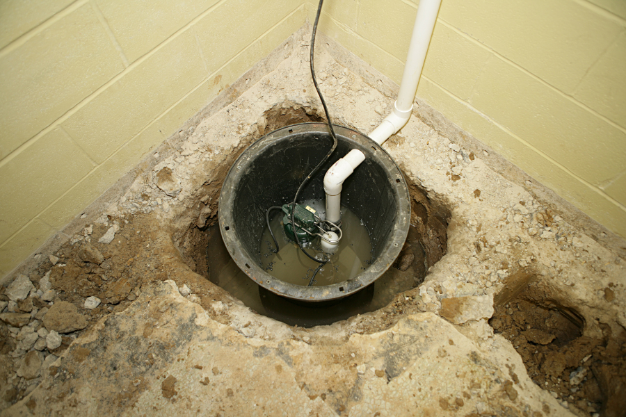 Sump pump failure causing basement flooding during winter thaw
