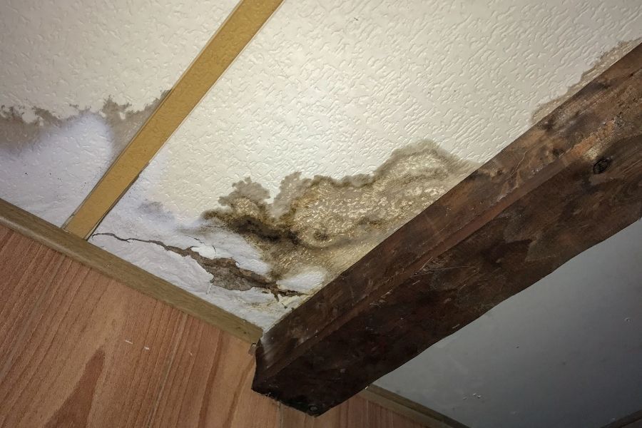 Ceiling water damage after heavy rain in a Southeastern Massachusetts home