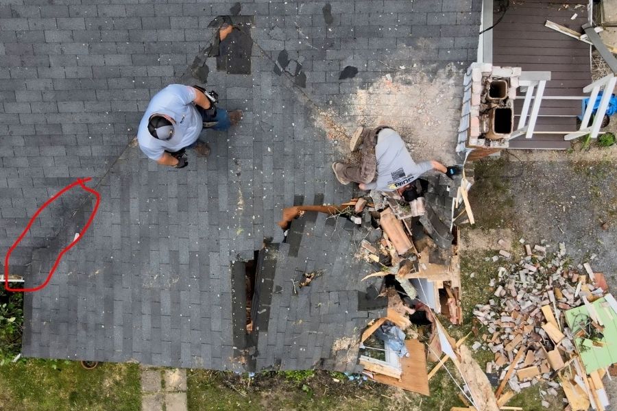 Storm damage to a residential roof in South Shore Massachusetts