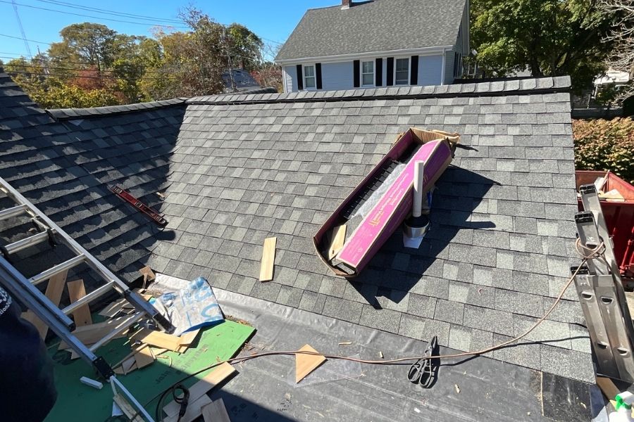 Roof damage on a South Shore home allowing rainwater in after a storm